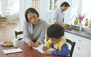 Mother Helping Son With Homework