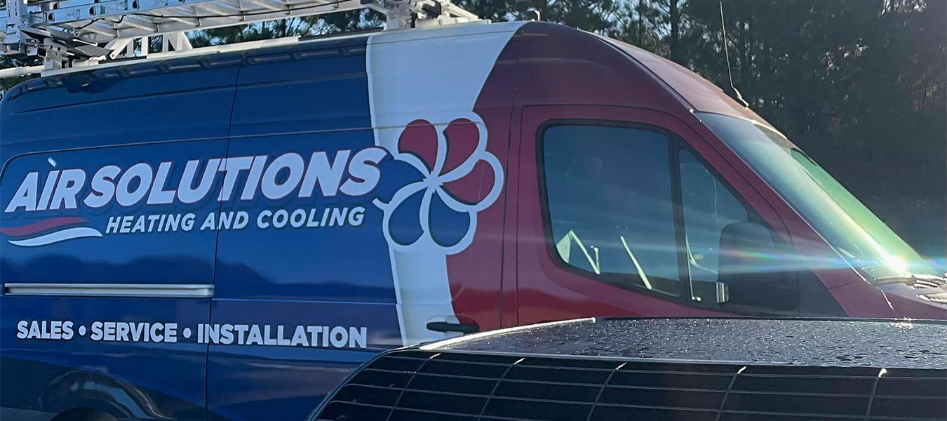 Air Solutions Van behind Trane unit